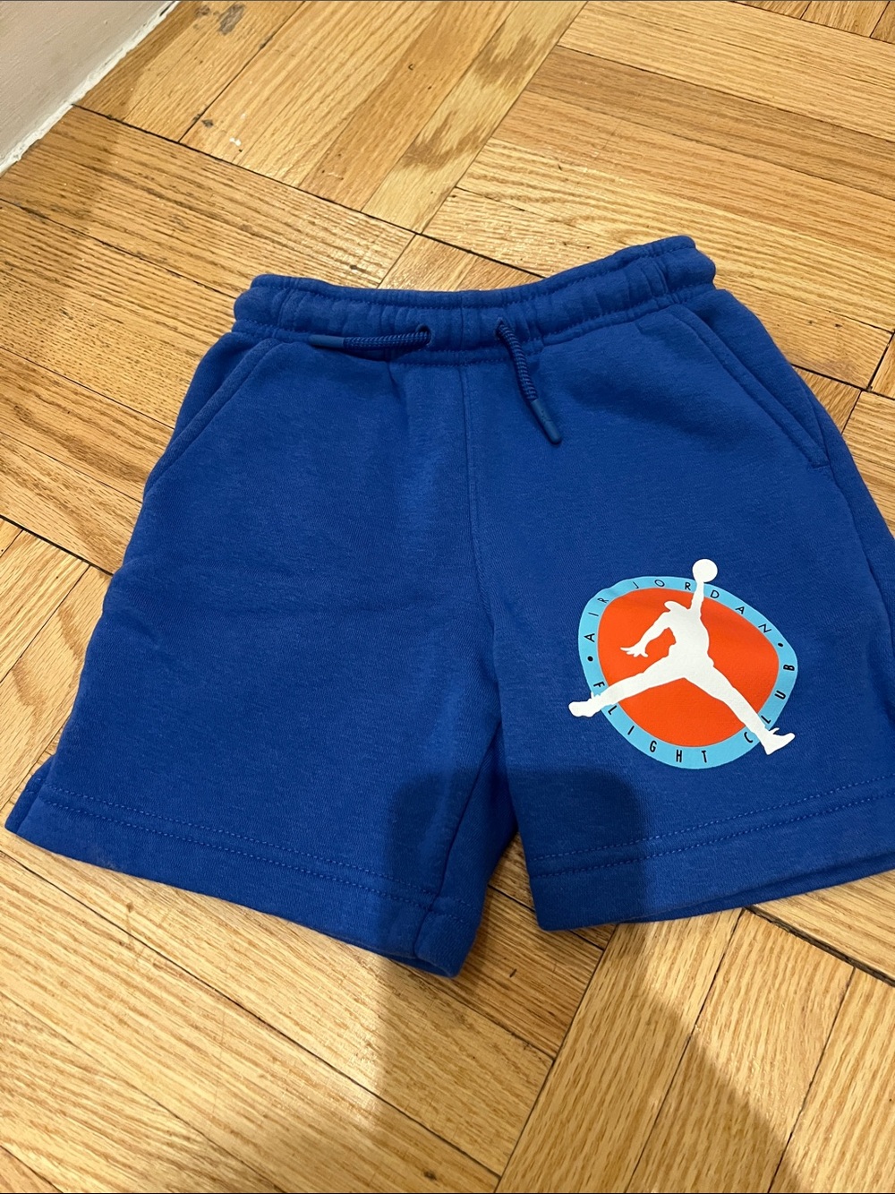 Nike Royal Blue Kids Shorts with White and Orange Jumpman